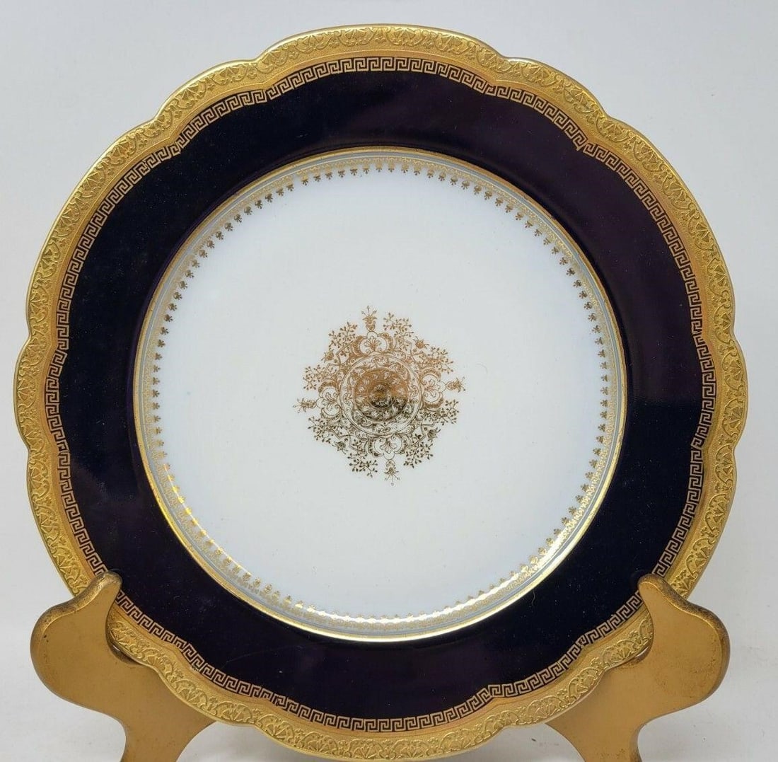 Sevres Style Gold Encrusted Plate - Dark Blue: Sevres Style Gold Encrusted Dinner Plate - Cobalt Blue 10 1/4". No chips, cracks, or crazing. Minor loss of gold. Some scratches from use.We can offer packaging and shipping on this lot to a domestic