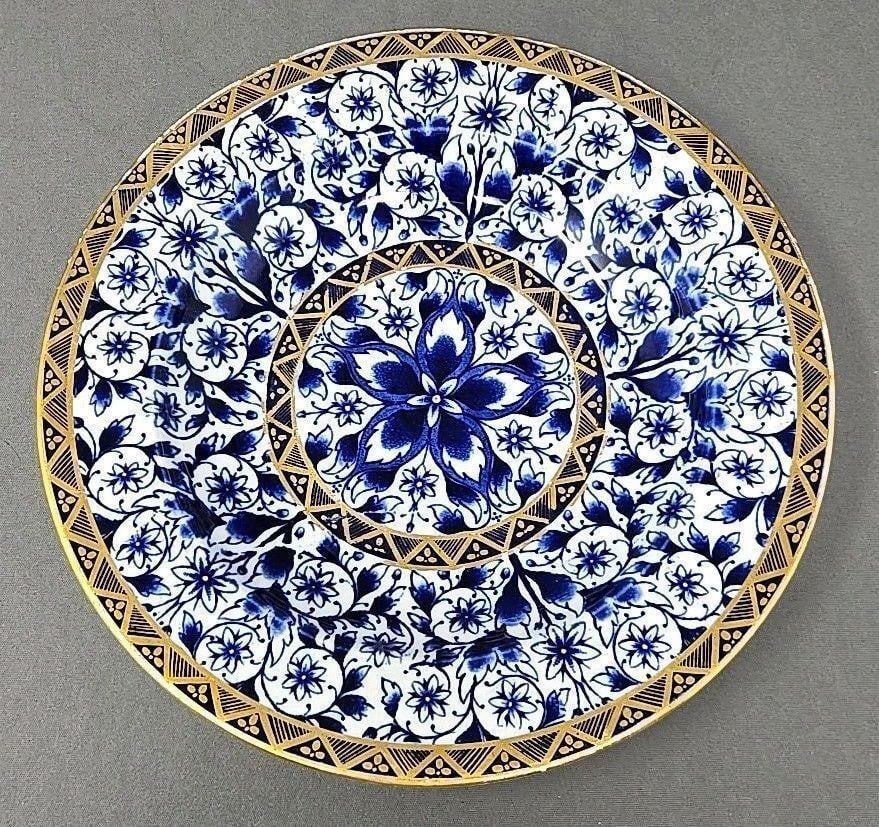 Crown Derby, Derby Lily Cobalt Blue Deep Plate: Crown Derby, Derby Lily pattern in cobalt blue and gold on white. Antique bone china deep plate or shallow rimmed bowl. Mark was used from 1877 to 1890. Measures 9 1/4 inches diameter and 1 3/8 inches