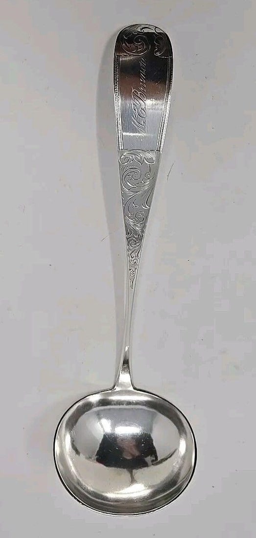 Canfield Bro & Co Baltimore Coin Silver Soup Ladle: Large coin silver ladle by Baltimore Maryland maker Canfield Bro & Company. This consisted of Ira Canfield, William Canfield and J.R. Arminger. This is in the Mayflower Pattern and has a name engraved