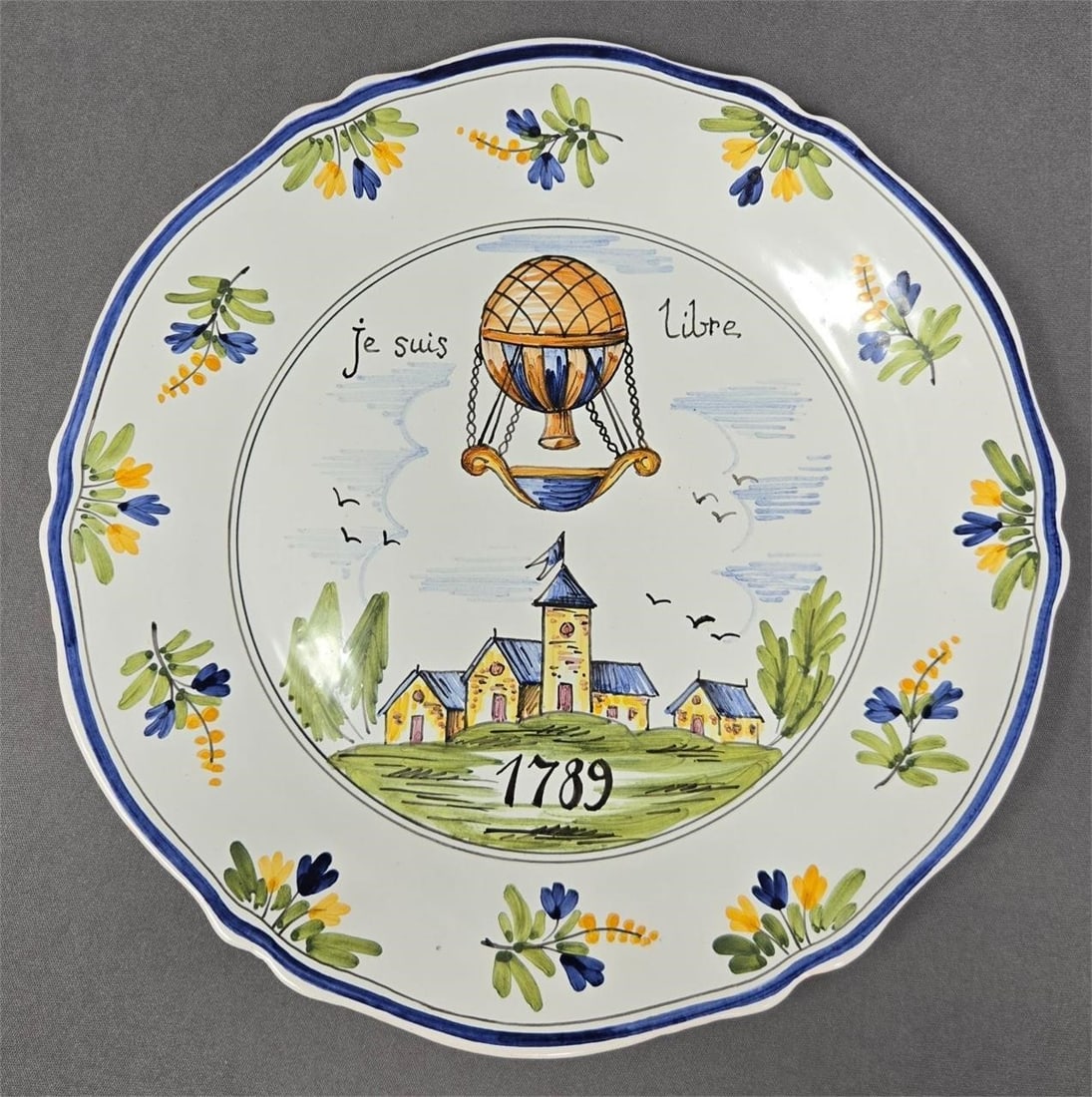 Faiencerie d'Art de Malicorne Balloon Plate: Faiencerie d'Art de Malicorne hot air balloon plate. Measures approximately 9 3/4 inches in diameter. Je Suis Libre 1789 on plate. Hand painted. Very good condition with out chips or cracks and only v