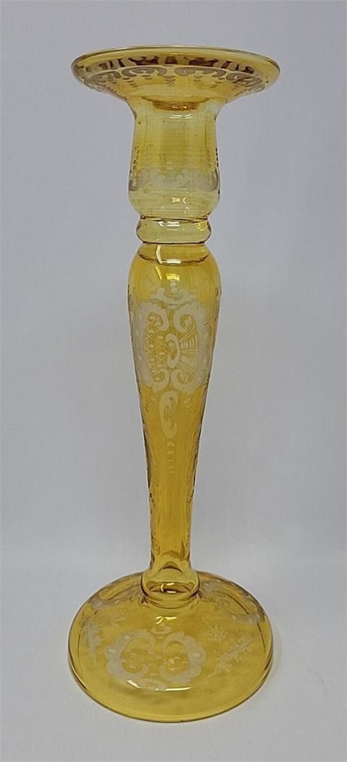 Bohemian Amber / Yellow, Clear Glass Candle Stick: Bohemian glass is a yellowish amber that is cut to clear for the design. Measures approximately 10 1/4 inches tall and 4 inches at the base. It is hollow up to the bowl for the candle. There is a smal