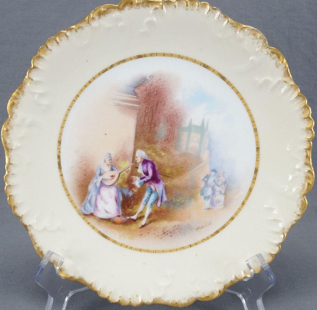 Limoges Hand Colored Watteau Scene 8 1/2" Plate: Nice antique porcelain plate. Beautiful hand colored scene with Georgian / Colonial couple with a woman playing a lute and another couple walking down the road. Has signed artist signature that reads