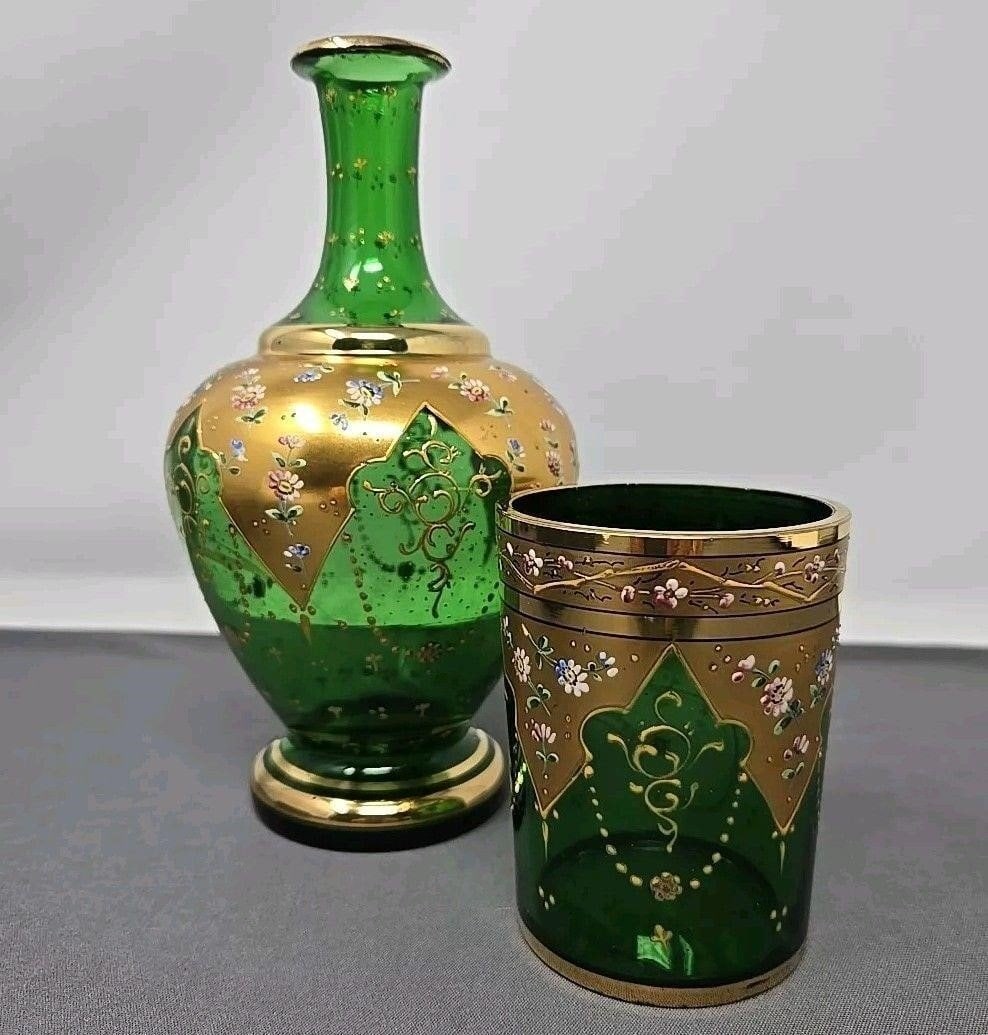 Moser Style Green Enameled Tumble Up Set: Antique Bohemian Moser Style Green Enameled Tumble Up Night Set, 19th Century. Heavy gold and enamel flowers. Some unique swirls in blown glass. Some wear to gold as shown in pictures. Carafe measures