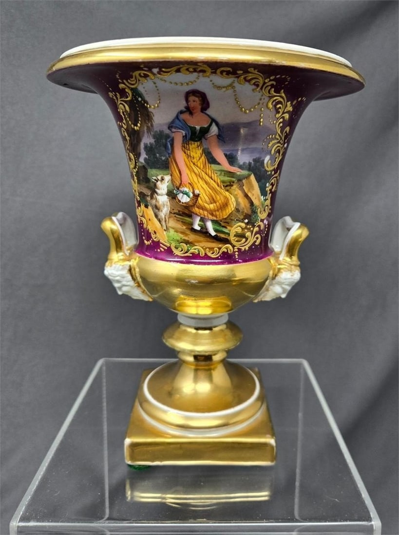 Old Paris Porcelain Urn Hand Painted Scenes 8 1/4": Old Paris Porcelain urn. Hand painted with 2 scenes one of a woman with a dog and another with a water and cliff. Bacchus heads at base of handles. No chips or cracks, there is loss to gold gilt and s
