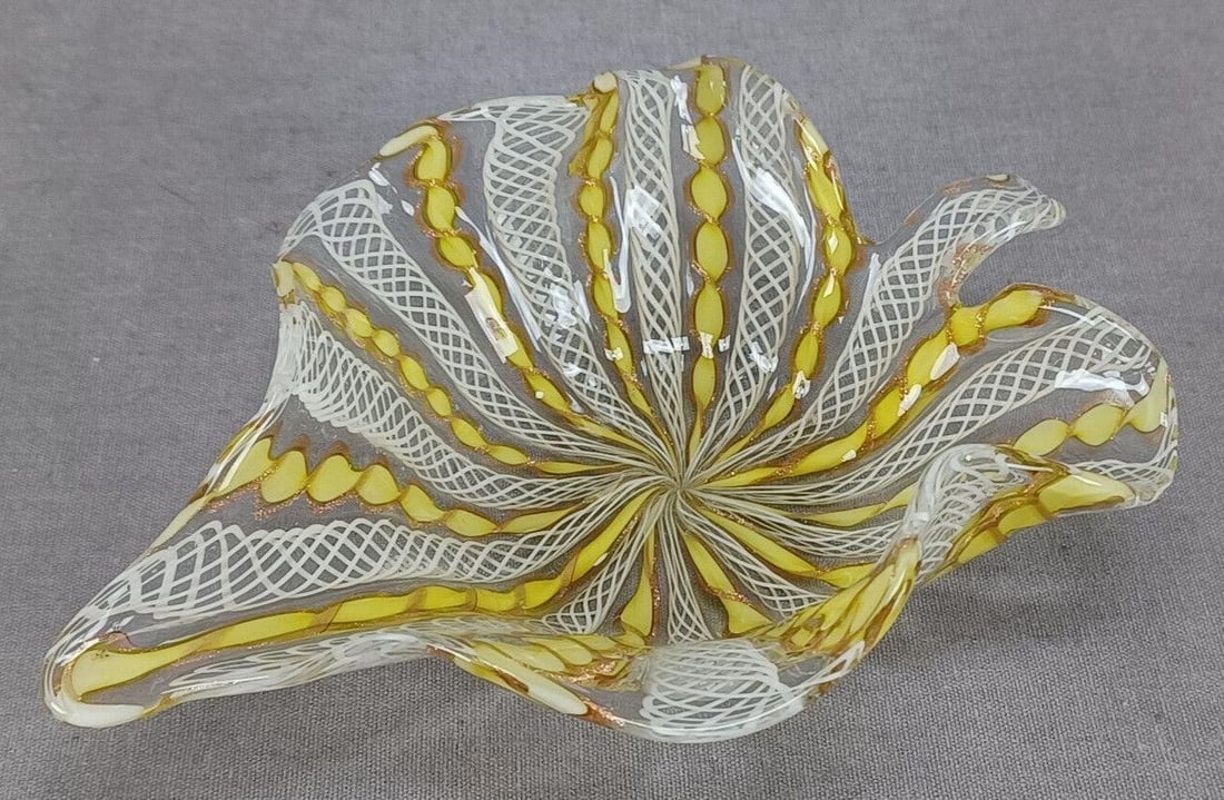 Murano Zanfirico Latticino Yellow Leaf Dish: Nice vintage hand blown yellow, aventurine, white, and clear zanfirico latticino leaf shaped dish. Rough pontiled base.Good condition.Measures approximately 5 3/8 inches long x 3 3/4 inches wide x 1