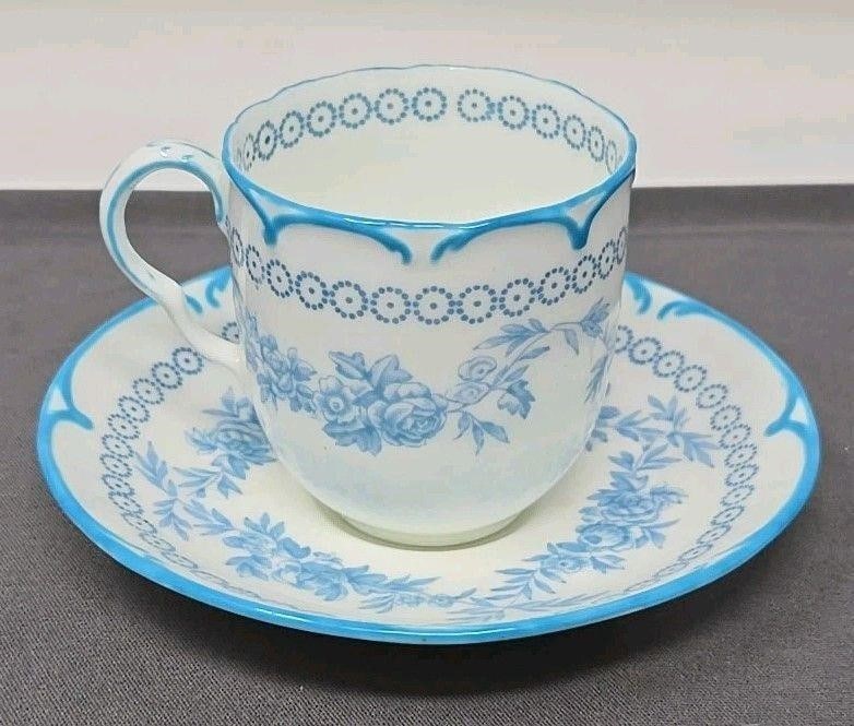 Cauldon Demitasse Cup & Saucer, C. 1897: Cauldon Aesthetic Style demitasse cup and saucer set. Blue design with a floral garland. I believe the pattern number is 8444. Circa 1897. No chips or cracks or crazing. Approximate measurements: The