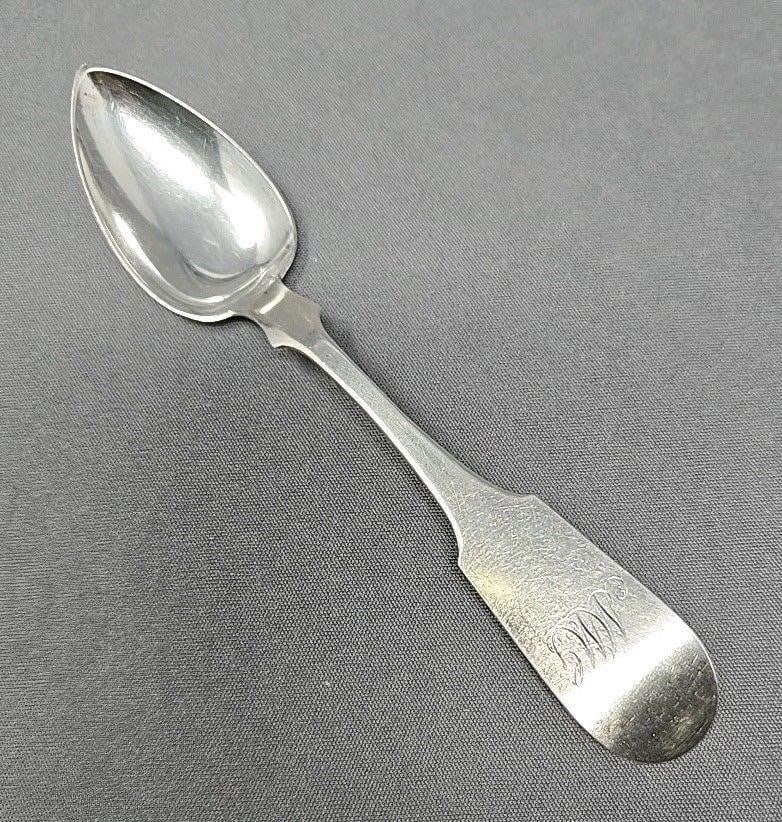 Coin Silver Spoon T. J. Megear Wilmington DE: Thomas Jefferson Megear silversmith from Wilmington Delaware from 1831 to 1833 and Philadelphia Pennsylvania 1832 to 1858. Measures approximately 5 7/8 inches long.We can offer packaging and shipping