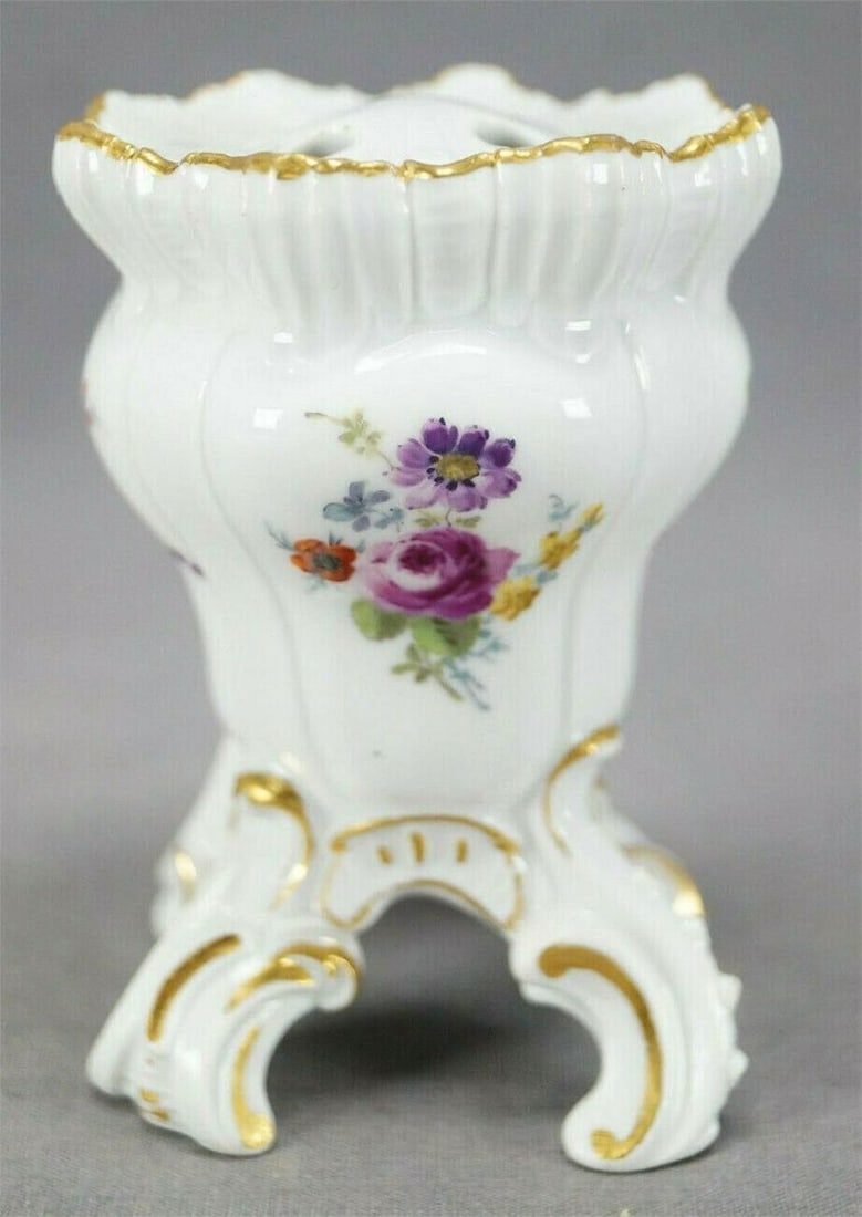 18th Century Meissen Hand Painted Flower Frog Vase: Nice 18th century Meissen porcelain flower frog vase. Decorated with hand painted flowers in pink, blue, purple, yellow, and orange. With gold gilding along the rim and gold highlights to the scrollwo