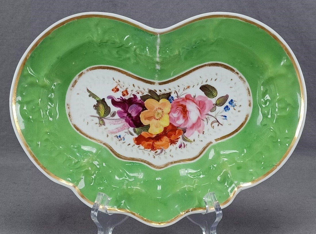 Chamberlain Worcester Hand Painted Floral Dish: Nice antique British porcelain kidney shaped / heart shaped dish with relief molded floral scrollwork border. Decorated with hand painted central bouquet with a pink rose and other flowers in red, pur