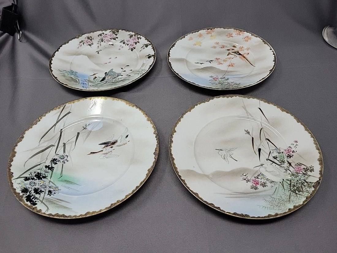 4 Antique Japanese Plates Kutani Water Birds: Set of four hand painted Kutani salad / dessert plates with birds and flowers. Some wear to the gold on border rim, but there are no chips or cracks. This is eggshell porcelain, very thin and delicate
