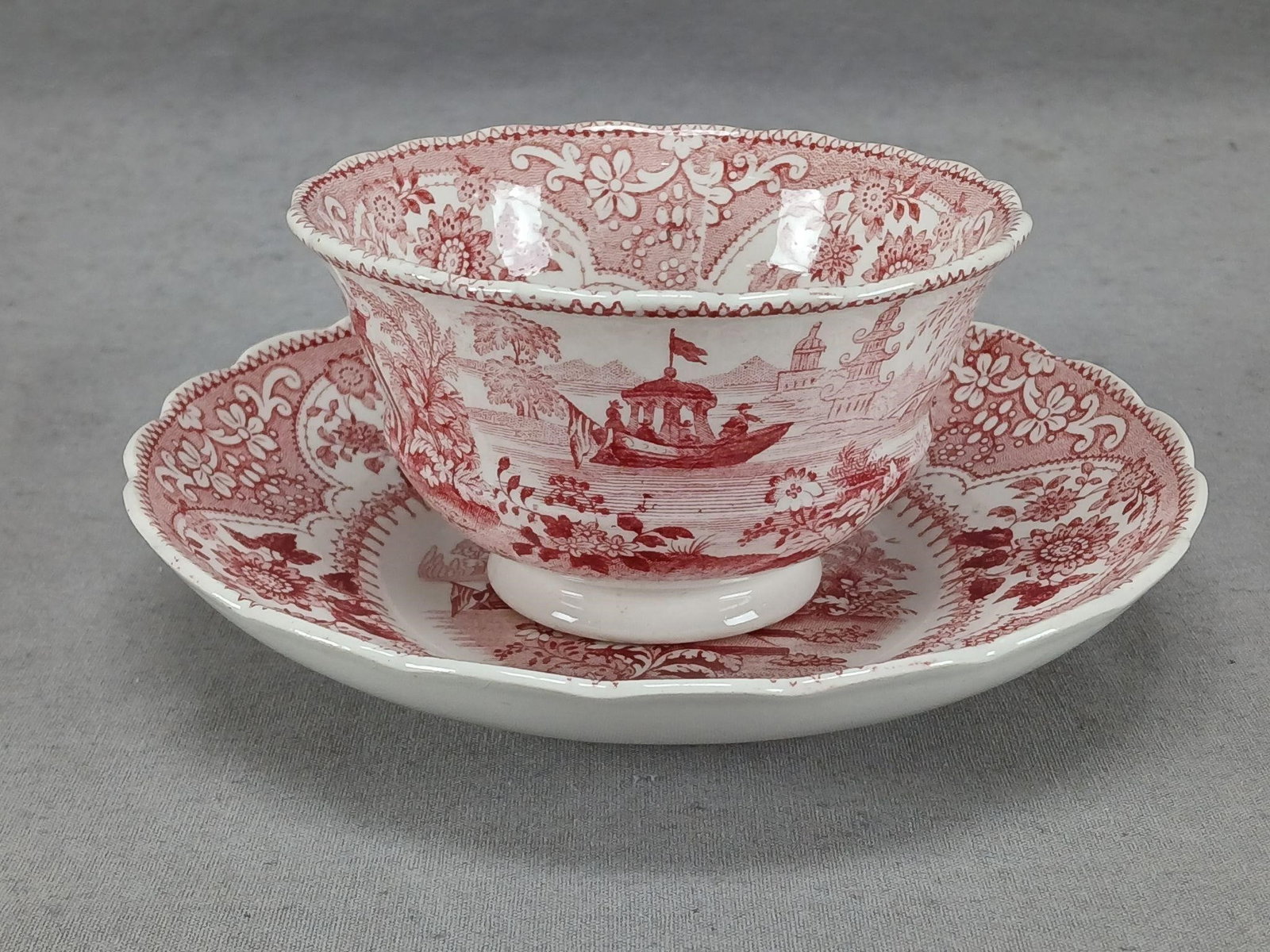 Adams Venetian Temple Transfer Tea Bowl & Saucer: Antique British pearlware tea bowl and saucer. Decorated in the Venetian Temple pattern in red transfer. Impressed Adams on the bottom. Also marked Venetian Temple in red. Produced by William Adams. C