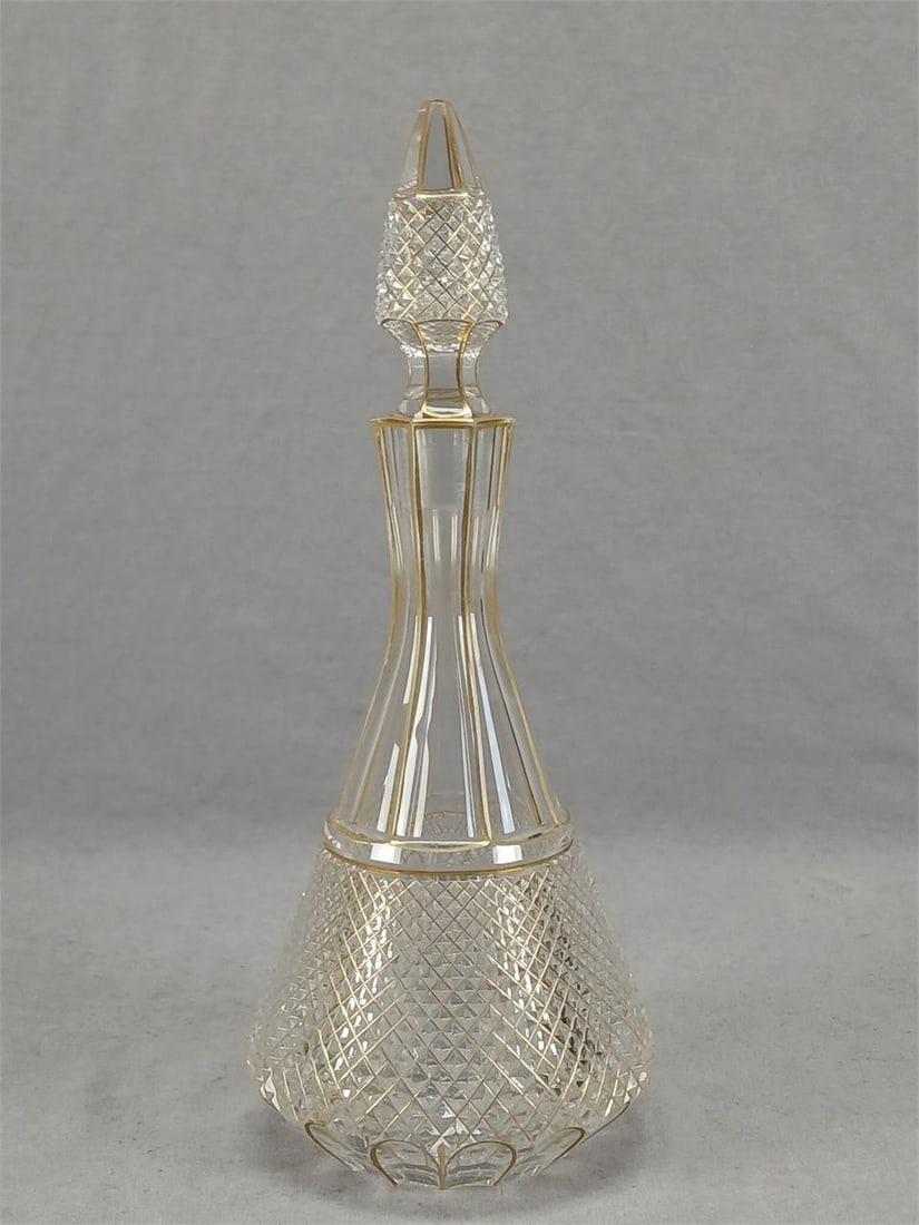Bohemian Moser Type Cut & Gold 9 7/8 Inch Decanter: Antique late 19th century Bohemian clear blown glass decanter. Panel cutting to the neck, top and bottom of the stopper. Diamond cutting to the bottom of the decanter and to the stopper. Gold highligh