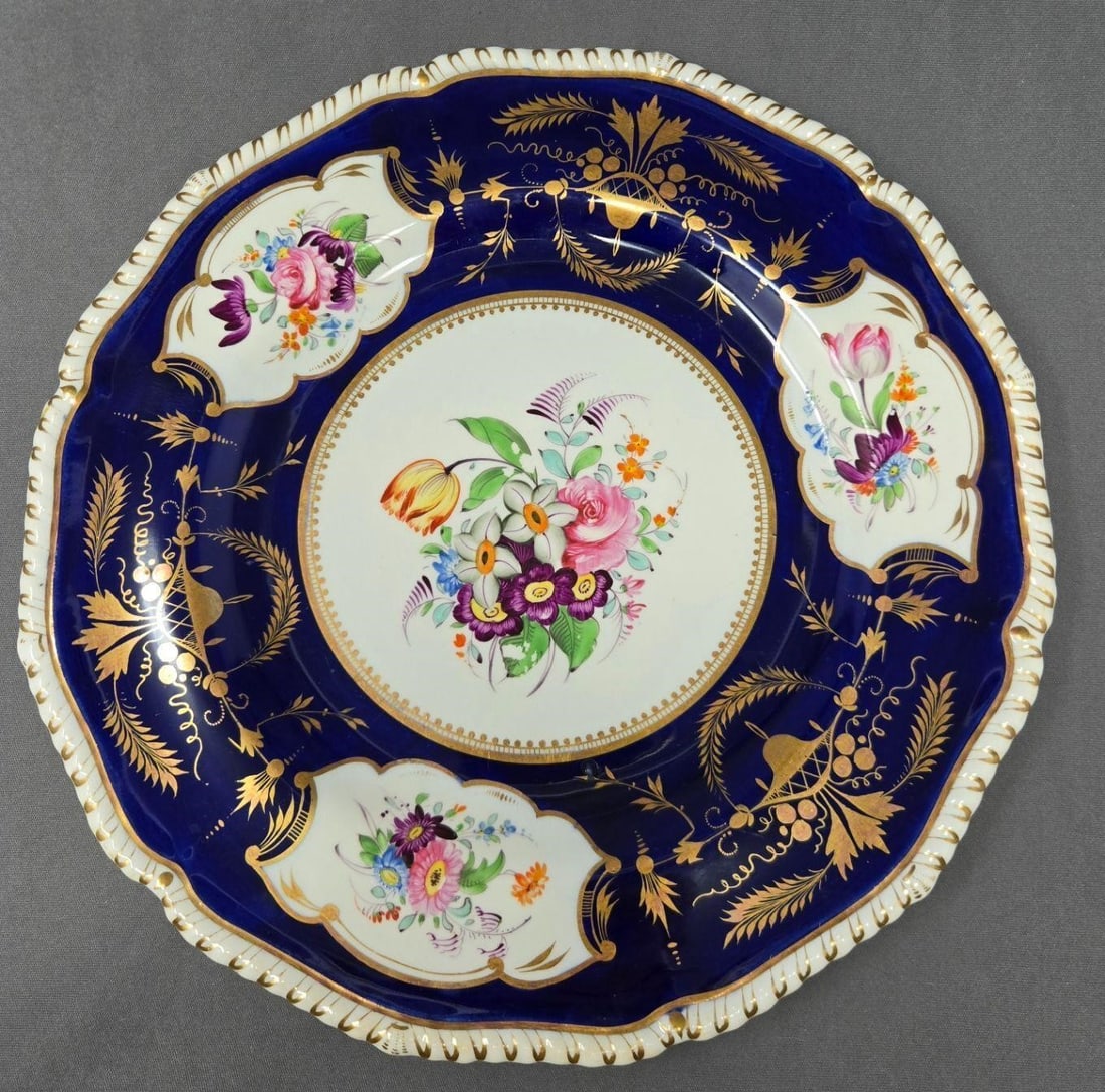 Bloor Derby Cobalt and Floral Plate 10 1/4": Bloor Derby hand painted floral and cobalt blue dinner plate. Gadrooned edge with ornate gold and floral medallions and center. No chips or cracks, there is crazing and some loss of paint on center fl
