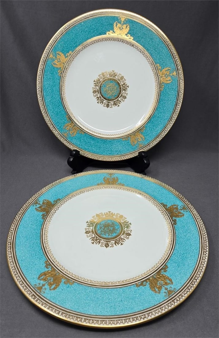 2 Wedgwood Turquoise Columbia Dinner Plates: Pair of Wedgwood Columbia pattern number W 3995 in turquoise. Turquoise and gold band with raised gold griffins with a gold and turquoise center medallion. Very nice condition with out chips, cracks, 
