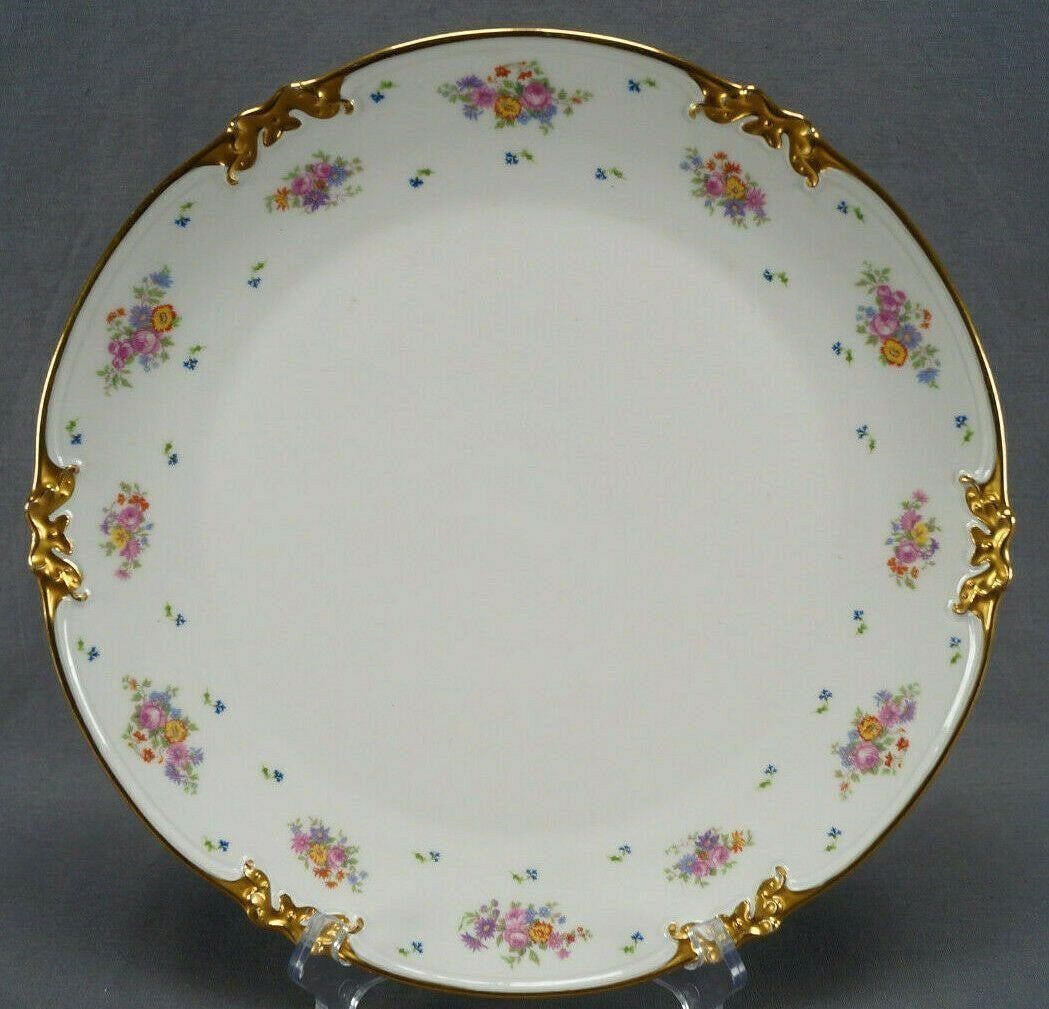 Limoges Multicolor Floral & Gold 12 Inch Charger: Nice French porcelain charger with relief molded ribbon edge. Decorated with multicolor flowers and small blue corn flowers along the border. With gold gilding along the edge. Marked on the reverse