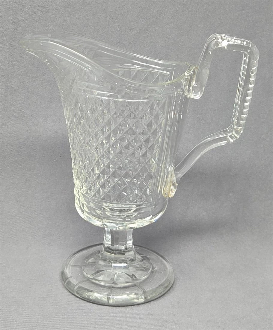 Anglo Irish Cut Glass Creamer C. 1820s 6" Tall: Anglo Irish Cut glass creamer. Circa 1820s. No chips or cracks there are some imperfections from the hand blown process. Measures approximately 6 inches and 5 3.8 inches from spout to handle. Star cut