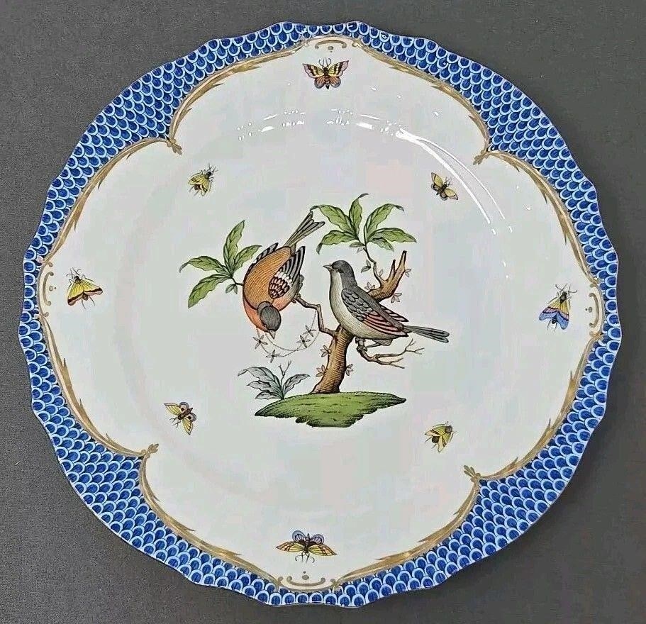Herend Rothschild Bird Blue Scale Service Plate: Very good unused condition from a store that closed. Herend Rothschilds Bird Blue Scale Border pattern form 1527. Measures approximately 11 inches.We can offer packaging and shipping on this lot to a 