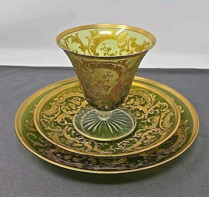 Saint Louis Chartreuse Green Dessert Trio: Antique Saint Louis chartreuse green acid engraved and gold gilt Trio. Three piece dessert set, grape gilt pattern. Cup measures 3 1/4 inch diameter and 3 1/4 inches in height. Dessert Plate measures 