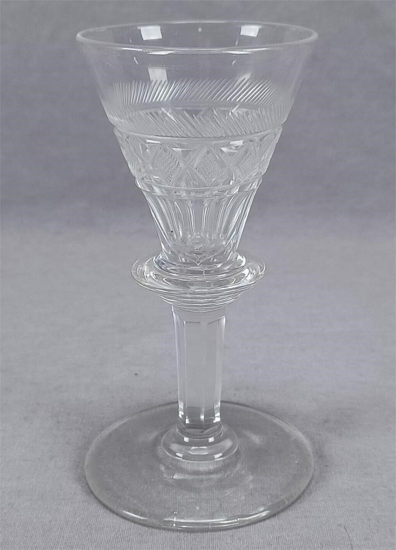 Pittsburgh Strawberry Diamonds Flint Glass Wine: Nice antique 19th century flint glass wine. Cut rays above strawberry diamonds and panels. Cut stem. Ground and polished pontiled base. Probably Pittsburgh. Circa 1830s.Good condition.Measures approxi