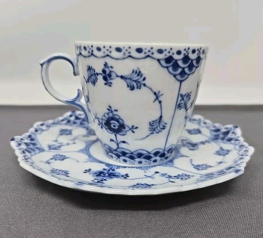 Royal Copenhagen Blue Fluted Cup & Saucer: Royal Copenhagen demitasse cup and saucer form 1038. Beautiful condition without chips, cracks, or scratches. Saucer measures approximately 4 1/2 inches, the cup is 2 inches tall, and 2 3/ 8-inch diam
