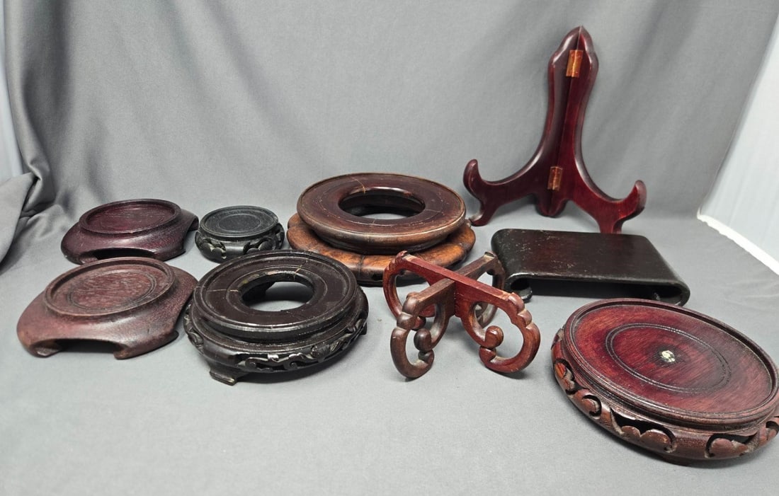 Lot 9 Vintage Wood Stands: Lot of 9 vintage Asian wood stands. Mostly good condition, one has a missing piece as shown and one has a few paint chips.