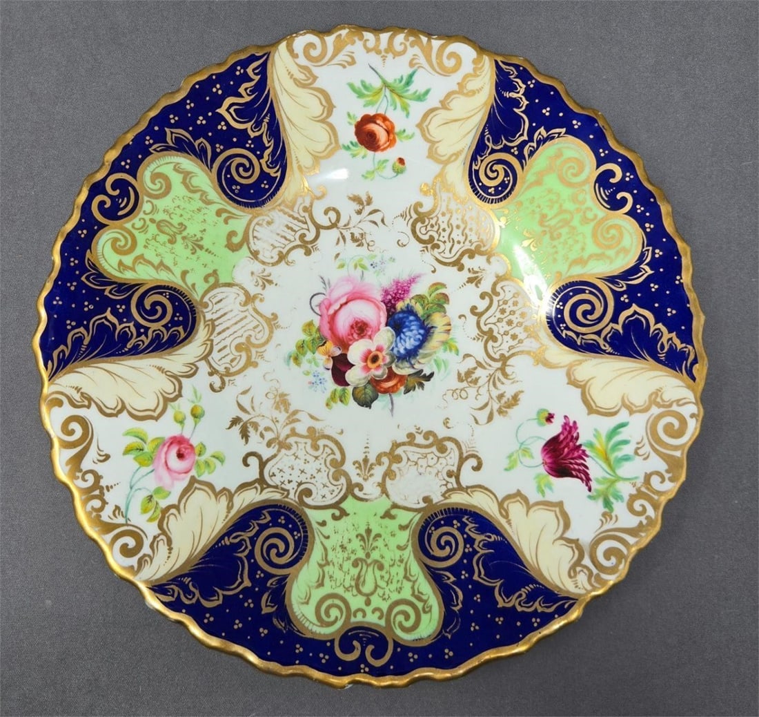 Unmarked Floral and Cobalt British 9" Plate: Cobalt blue, mint green, gold and colorful flowers British unmarked plate. Circa 1820. No chips or cracks there is some loss to gold on the rim and from stacking. Only minor scratches. Measures approx