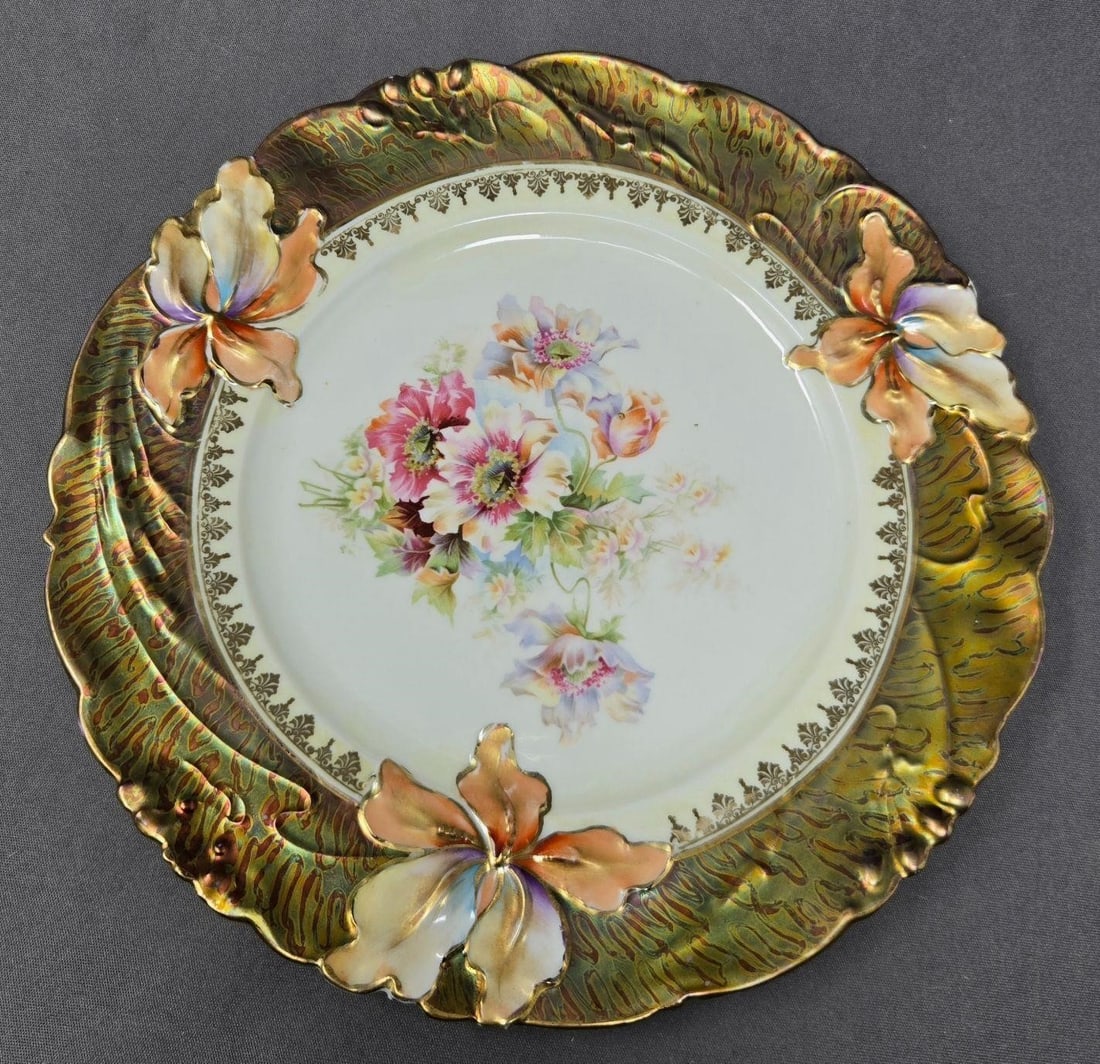 Reinhold Schlegelmilch RS Germany Mold 26 Plate: Reinhold Schlegelmilch RS Germany Iris Mold 26 Iridescent edge plate. Three raised irises with embossed berries and an iridescent multi colored glaze border that surrounds a bouquet of rose of Sharon