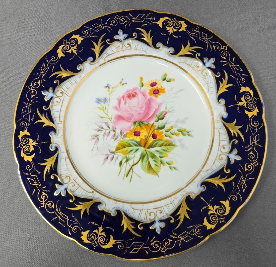 Fischer & Meig Floral & Cobalt Blue Plate 8 1/2": Fischer & Meig, later Pirkenhammer, cobalt blue, gold and floral bouquet plate with a pink rose and brown eyed Susans. Nice condition without chips or cracks and only very minor scratches. There is go