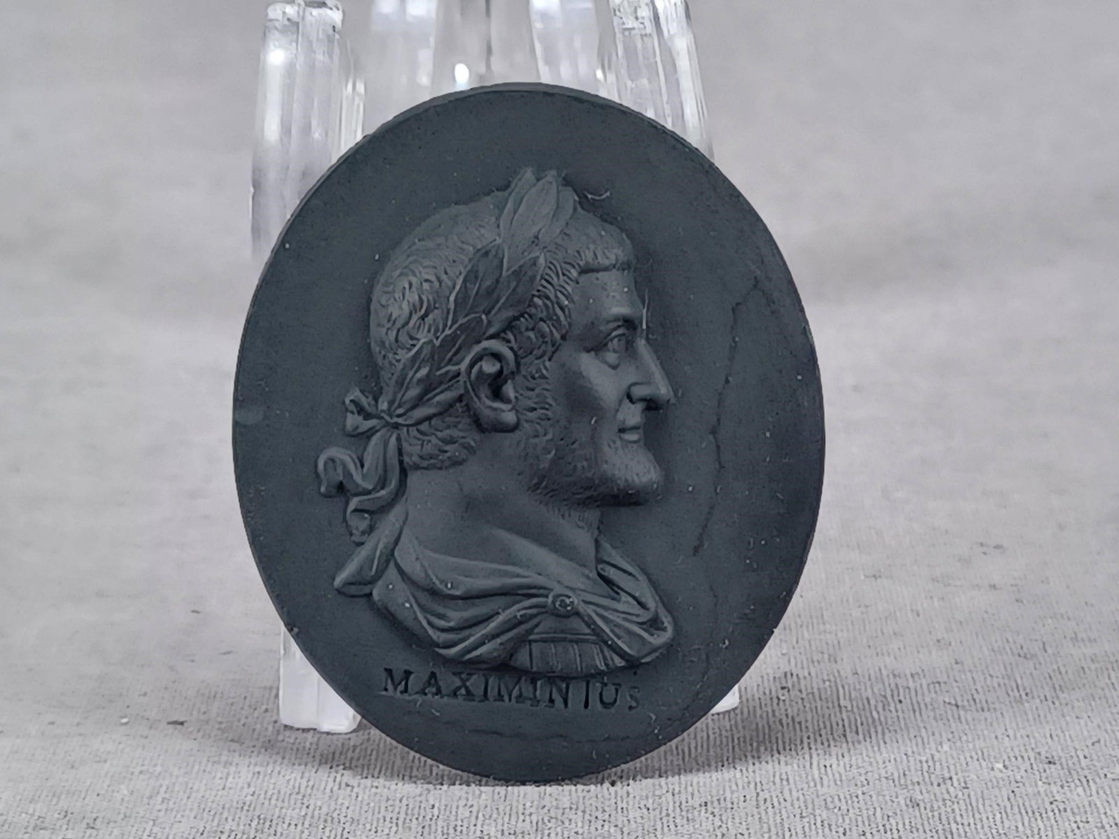 Wedgwood Maximinus Thrax Black Basalt Plaque: Rare antique British black basalt portrait medallion of Maximinus Thrax. Impressed under the portrait Maximinius. Impressed Wedgwood on the reverse. Circa 1780 to 1795.Has a chip and a small flake to 