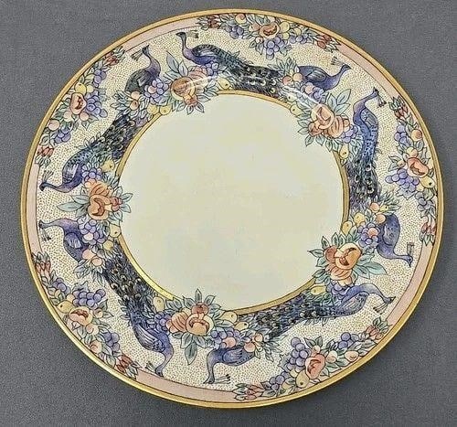 Limoges Artist Painted Peacocks Plate: Antique Limoges Union Ceramique blank and artist decorated with a border of peacocks and hens with fruit and a gold dotted background. Gold gilding along the edge and inner band with an ivory center. 