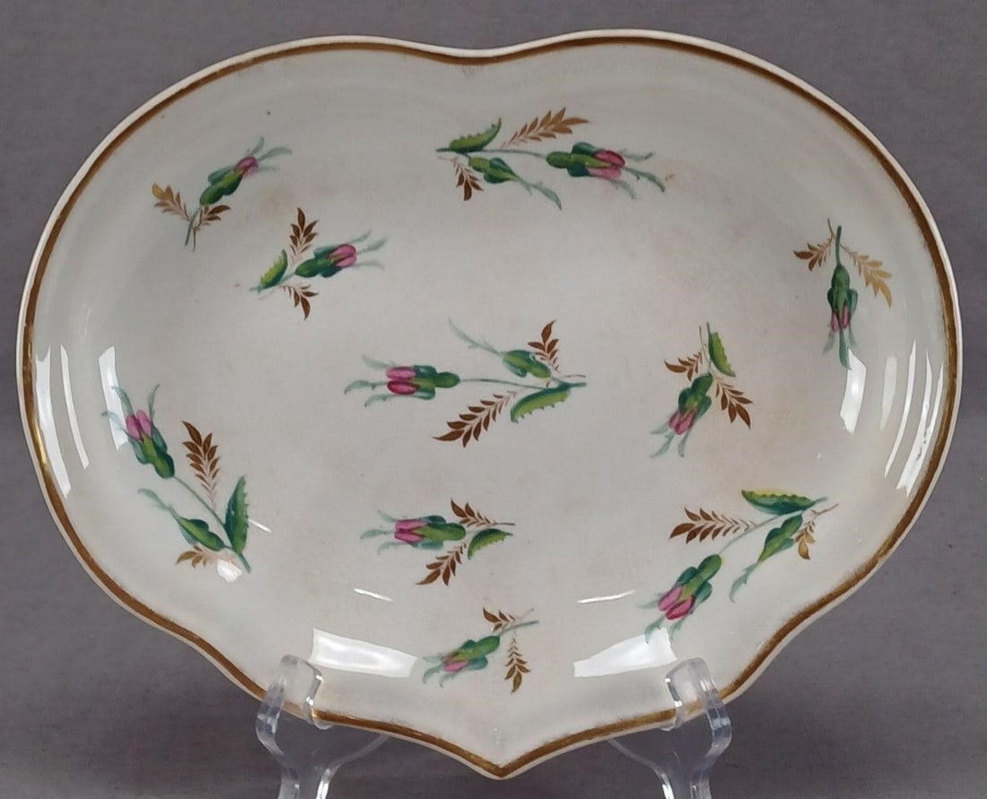 Derby Hand Painted Pink Floral Dish C 1806-1825: Antique British porcelain heart shaped dish. Decorated with hand painted pink flowers and gold leaves. Gold gilding along the edge. Marked on the bottom with the red Derby mark used between 1806 and 1