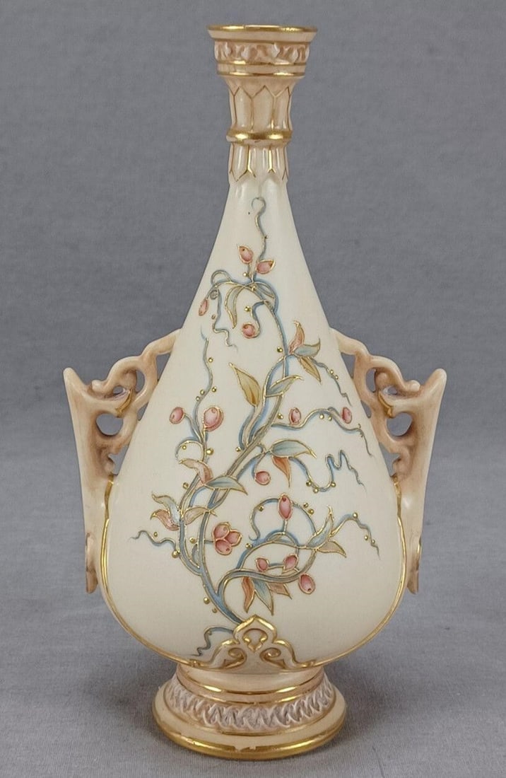 Royal Worcester Berries Blush Ivory 6 3/4" Vase: Antique British porcelain vase. Decorated with hand painted pink berries with raised gold highlights and beads over a blush ivory background. Marked on the bottom with the Royal Worcester mark with a