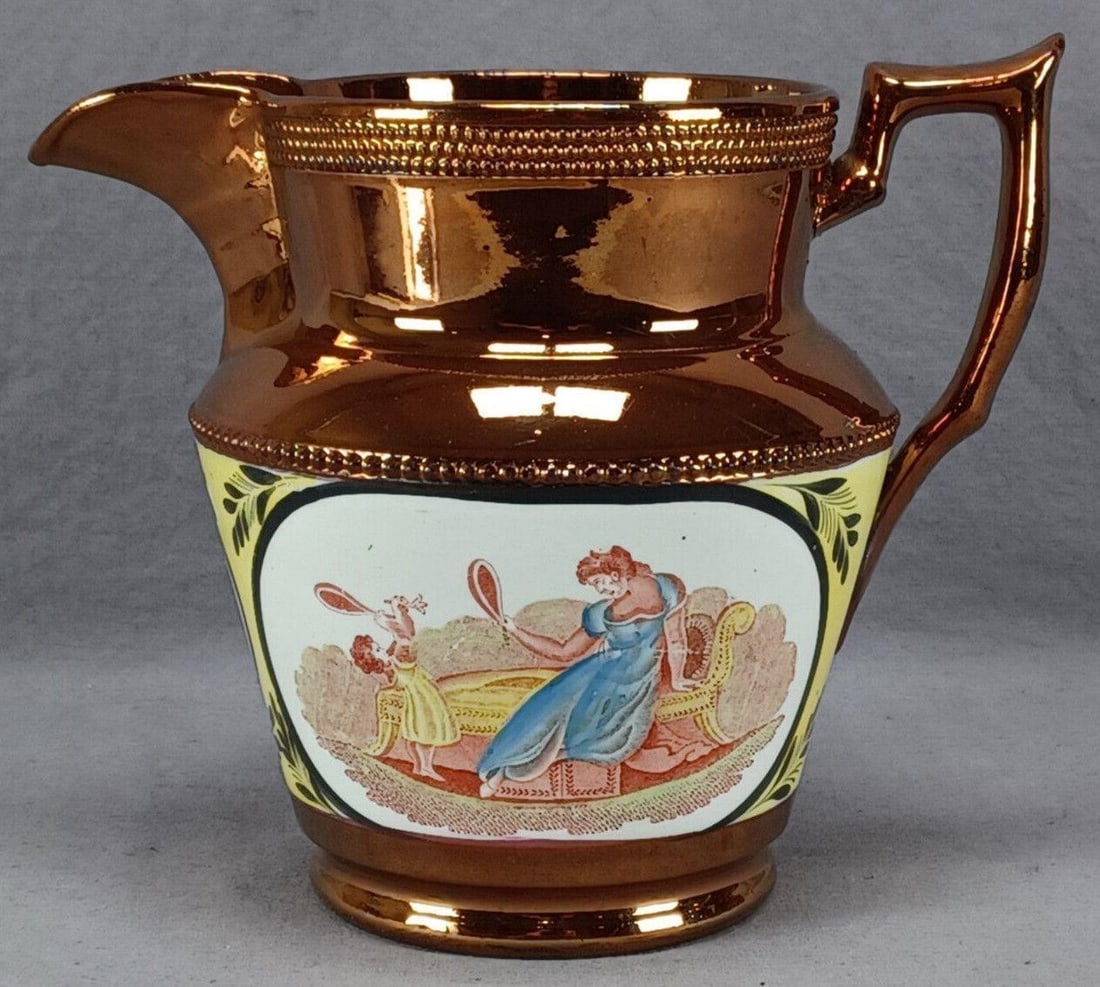 Battledore & Shuttlecock Copper Luster 7 3/4" Jug: Nice antique British large copper luster jug with beading. Has a wide yellow band with hand colored bat print transfer scenes of Battledore & Shuttlecock on either side and an additional bat printed s