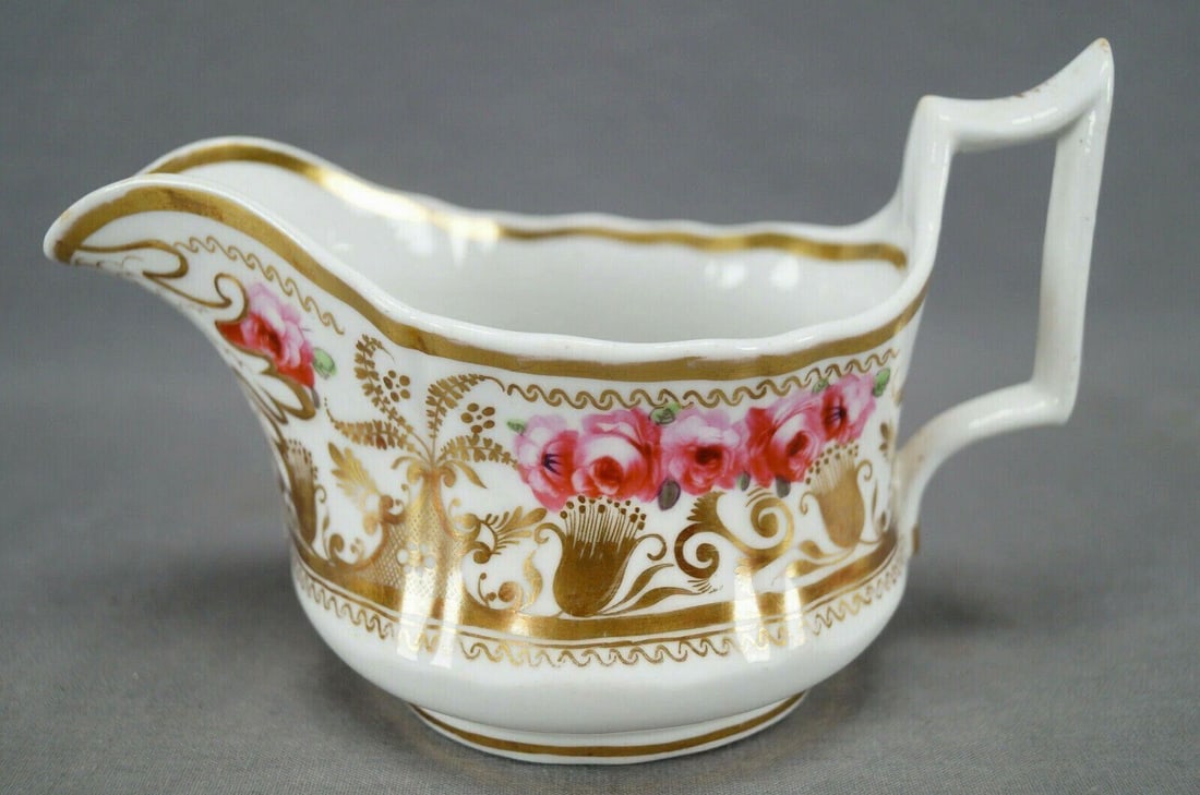 New Hall Pattern 2901 Porcelain Creamer: Early 19th century antique bone china / porcelain creamer. Decorated in New Hall's pattern 2901 with hand painted pink roses and gold gilt floral designs. Marked on the bottom 2901. Circa 1820 to 1825
