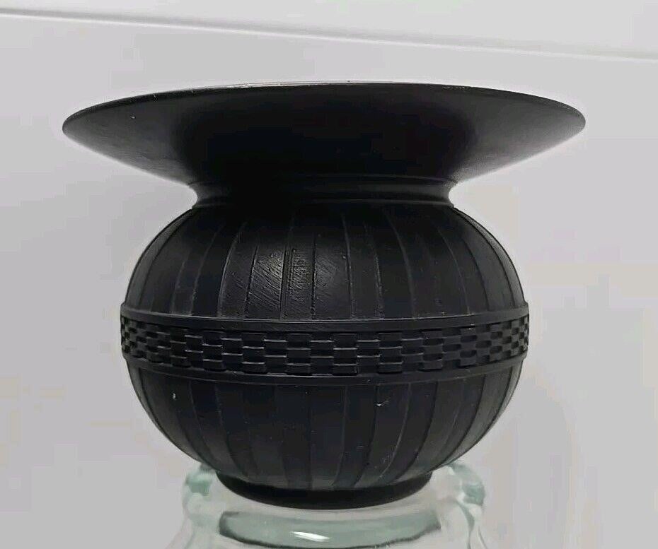 Wedgwood Black Basalt Spittoon 1920s: Wedgwood black basalt spittoon . Measures approximately 3 1/2 inches tall and 5 inches wide. No chips or cracks. There are some marks on the top as well as some rust inside. Someone may have put in a
