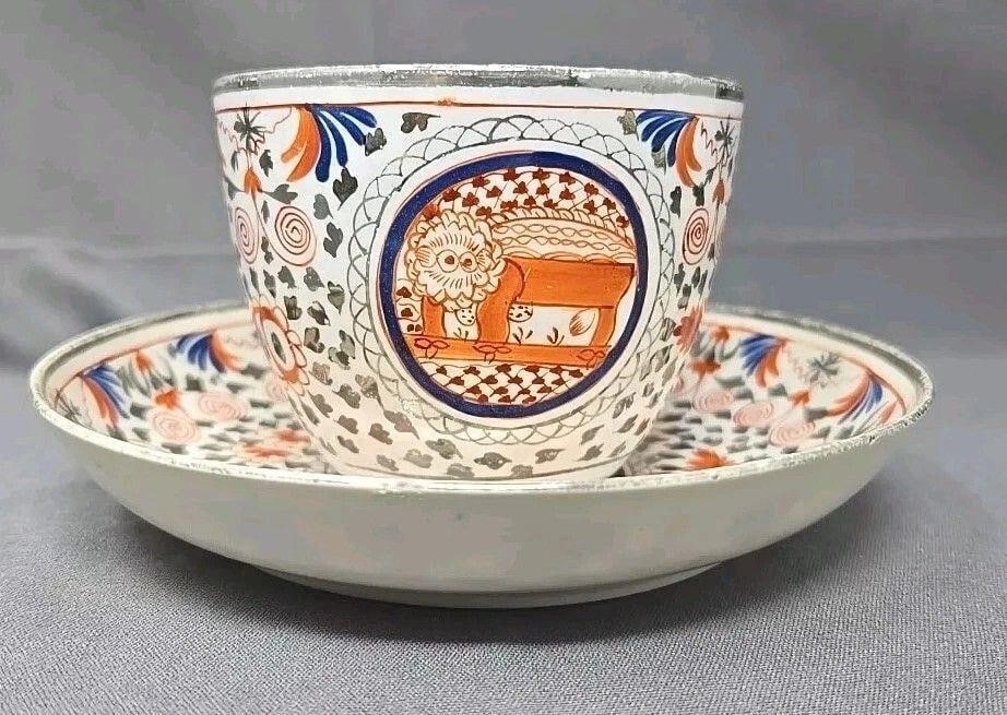 Thomas Wolfe Factory Z Cup Saucer, Crazy Cow: Thomas Wolfe Factory Z cup and saucer in Pattern N 106, Crazy Cow. Circa 1810. No chips or cracks, there is crazing on inside of tea cup along with staining on inside and underside of teacup. There is
