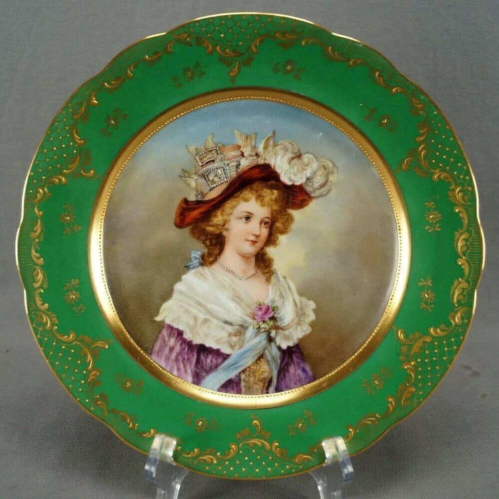 Dresden Hand Painted Green Lady Portrait Plate: Beautiful porcelain cabinet plate. Decorated with a hand painted portrait of an 18th century lady. Has a band of gold gilding with a thin band of gold beading along the inner rim of the plate. The bor