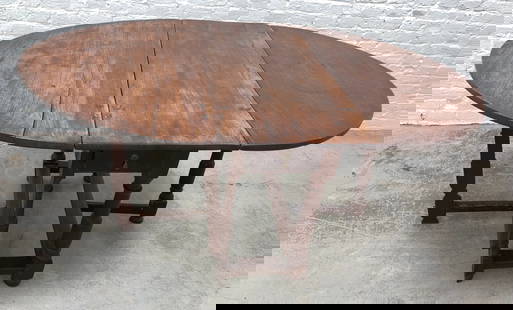 Rare Split Leg Period William And Mary Gate Leg Dropleaf Table c. Mid 1600’s: A very early walnut gate leg table. It is a very rare form with a split leg design. The table is all original including the drop pendant pull on the drawer. The secondary wood for the drawer is pine