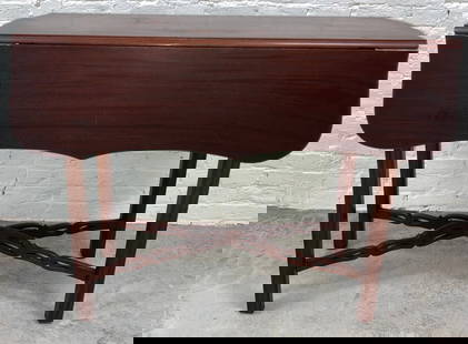 Antique Chippendale Mahogany Pembroke Table c. 1770: Period Chippendale pembroke table made of Honduran mahogany. The top has scalloped dropleafs and a classic Chippendale designed skirt. The table top sits on top of Marlborough legs with pierced
