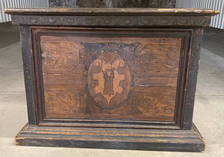 Medieval 17th Century European Armorial Box With Coat of Arms: This is a 17th century European armorial box with coat of arms. It has original old hand hammered hinges with rose head nails. The box is made of mixed woods and has a molded platform and a beaded