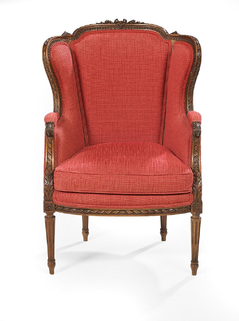 Louis XVI-Style Fruitwood Bergere avec Orielles: Louis XVI-Style Fruitwood Bergere avec Orielleslate 19th century, the domed and padded back surmounted by a floral crest, joined by shaped and padded sides and arms to the cushioned seat, raised on st