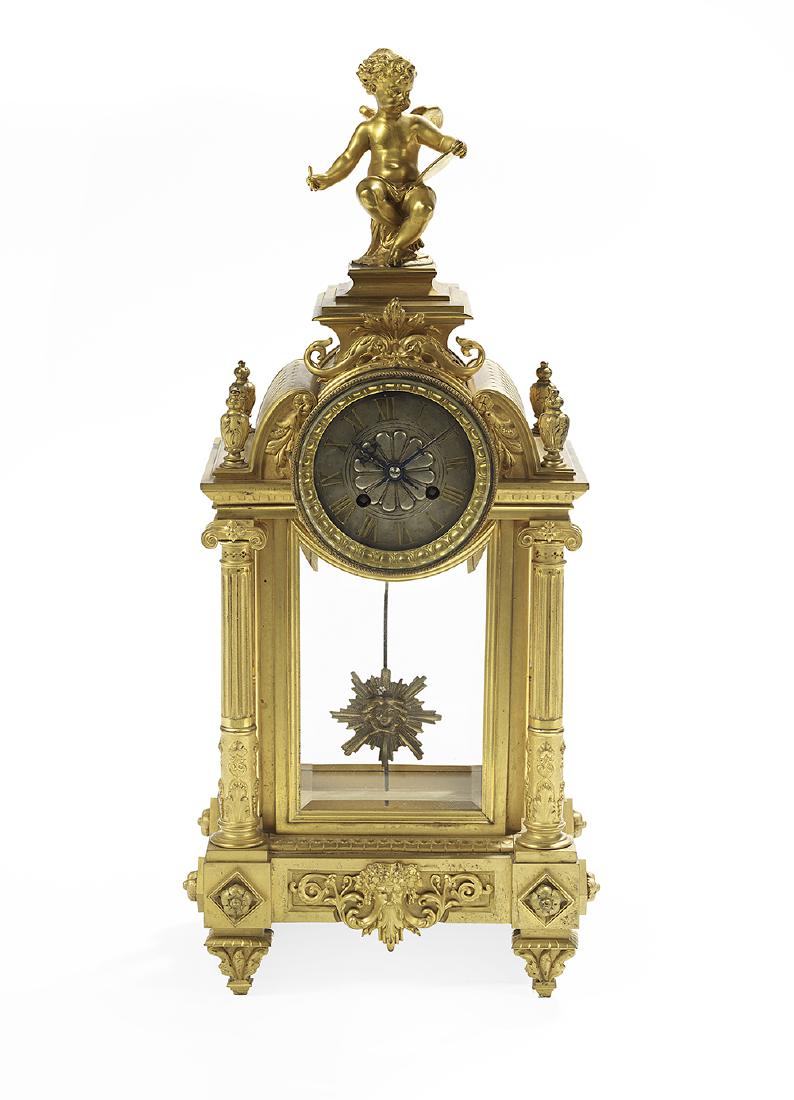 Samuel Marti et Cie Crystal Regulator: Samuel Marti et Cie Crystal Regulator fourth quarter 19th century, French, in a baroque-inspired gilt-bronze case set with beveled glass panels, with molded feet and a bacchanalian masque at the base,