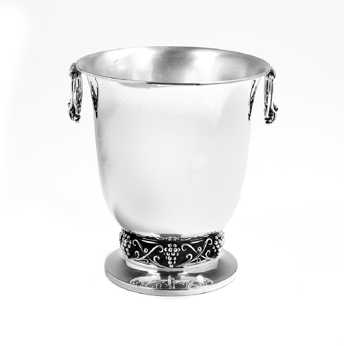 Spanish Silver Wine Cooler: Spanish Silver Wine Cooler mid-20th century, Barcelona, first standard (.915) silver, in the Danish Modern taste, of inverted bell form, with scrolling wire and grape cluster handles and base, above a
