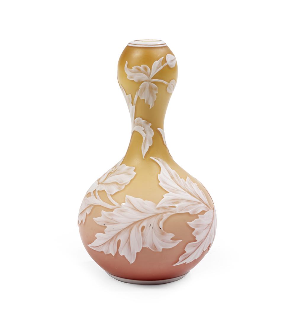Thomas Webb & Co. Cameo Glass Vase: Thomas Webb & Co. Cameo Glass Vase fourth quarter 19th century, English, cut with flowers, leaves and butterflies on a shaded peach ground, the base with an etched mark, "Thomas Webb & Co.". h. 7", di
