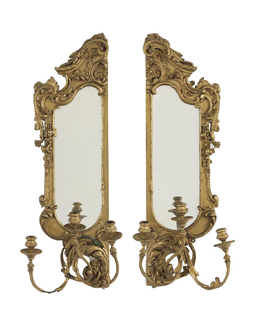 Pair of French Mirrored and Giltwood Sconces: Pair of French Mirrored and Giltwood Sconces second quarter 20th century, in the rococo taste, each with three scroll-molded candle arms set with wooden candle cups and drip pans. h. 38-1/2", w. 14-3/