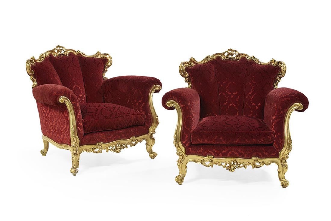 Pair of Giltwood and Upholstered Bergeres: Pair of Giltwood and Upholstered Bergeres early 20th century, in the Louis XV taste, each with a pierced scrolling crest above a trisected padded back, joined by outscrolled padded arms to the cushion