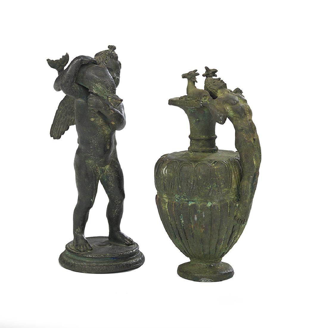 Two Patinated Bronze Grand Tour Souvenirs: Two Patinated Bronze Grand Tour Souvenirs ca. 1900, Italian, after the Antiques, one depicting a putto holding a dolphin, h. 8-3/4", w. 3-1/4", and the other an amphora with a handle in the form of a