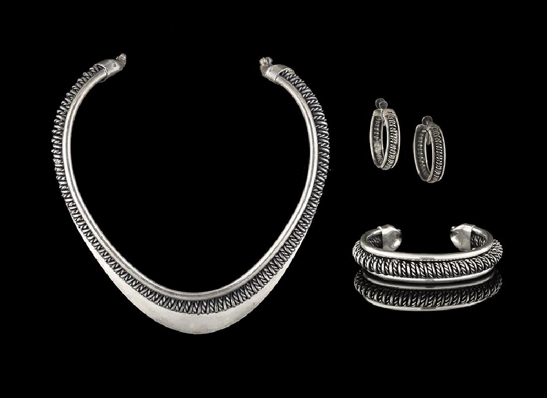 Three-Piece Old Newbury Crafters Jewelry Suite: Three-Piece Old Newbury Crafters Jewelry Suite sterling silver, including a hand-wrought choker, bracelet and earrings, marked "O.N.C., Handwrought, sterling" and stamped with the whale hallmark. chok