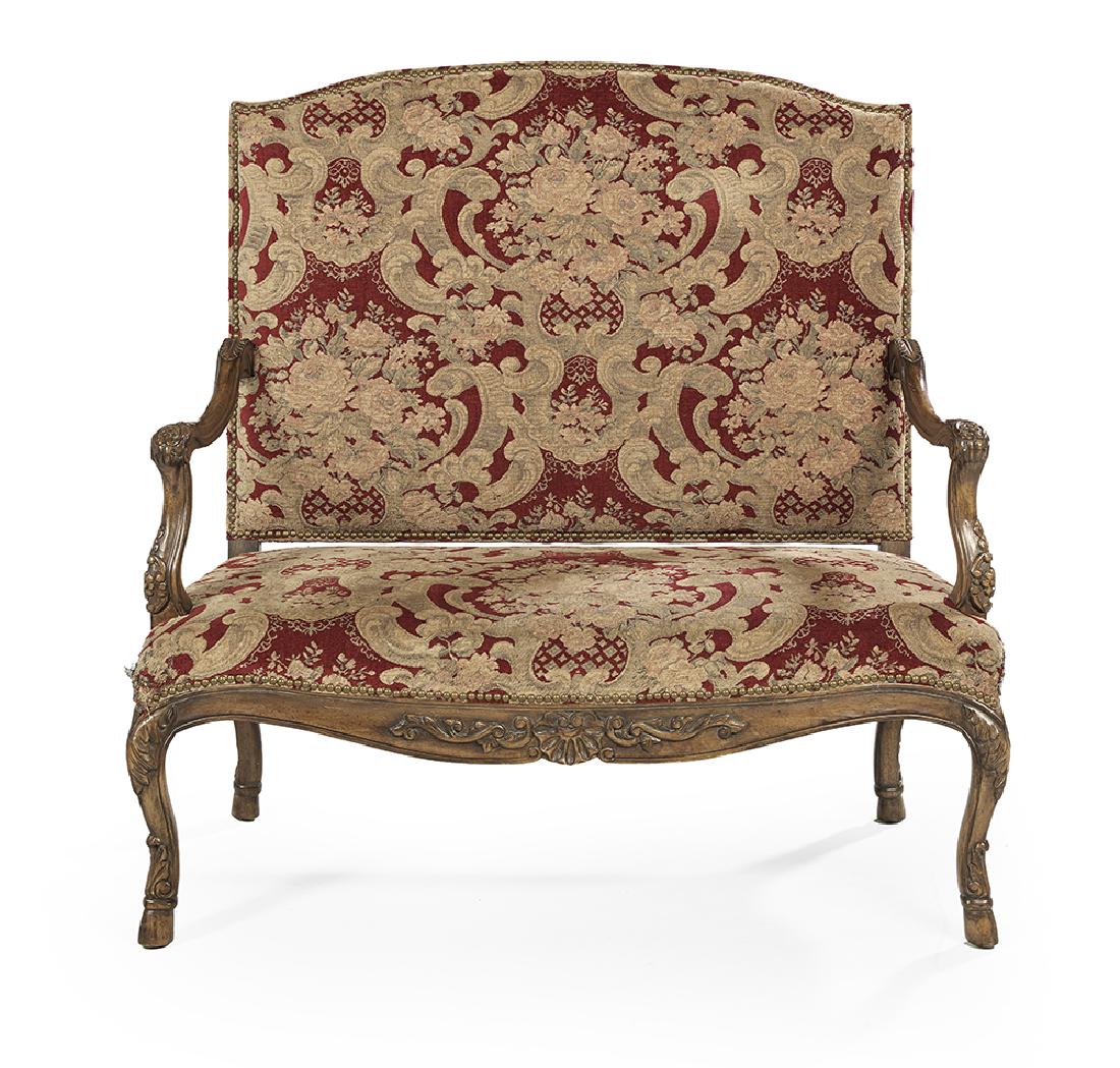 Regence-Style Fruitwood Settee: Regence-Style Fruitwood Settee early 20th century, the slightly domed and padded rectangular back joined by molded downswept arms to the padded seat, raised above a shaped shell-carved apron on cabrio