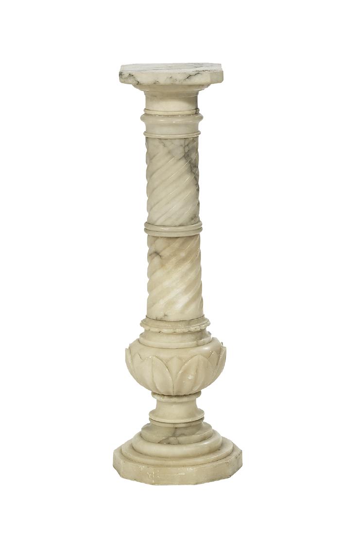 Italian Alabaster Pedestal: Italian Alabaster Pedestal ca. 1900, on a faceted base, decorated with carved lotus leaves. h. 37", w. 9", d. 9"